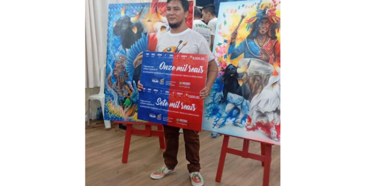Artista de Maués vence concurso e assina cartaz do Festival de Parintins 2026